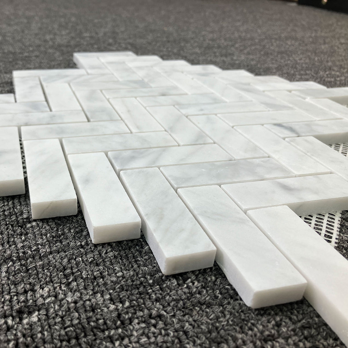 Carrara Herringbone Soft Matt Porcelain Mosaic laid tile layout