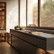 Gessi Su and Gi Retractable Spout Right Angle Mixer in a styled room