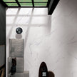 Elite Marble Bianco Venato Porcelain Tiles in a room setting