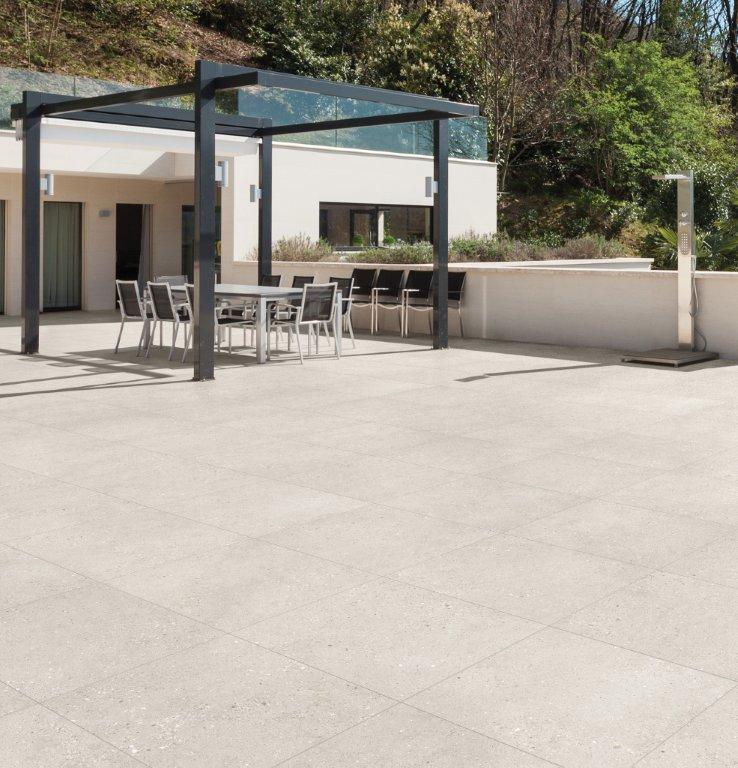 Frammenti Beige Porcelain Tiles in a room setting
