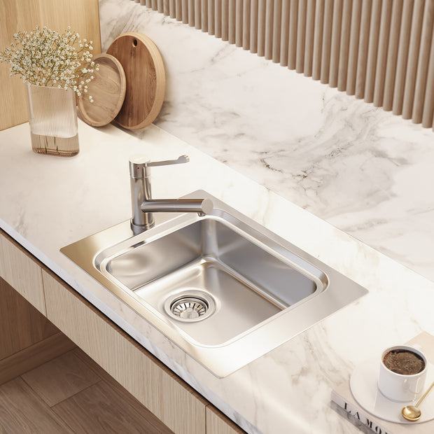Puro Single Bowl Topmount Care Sink in a styled room