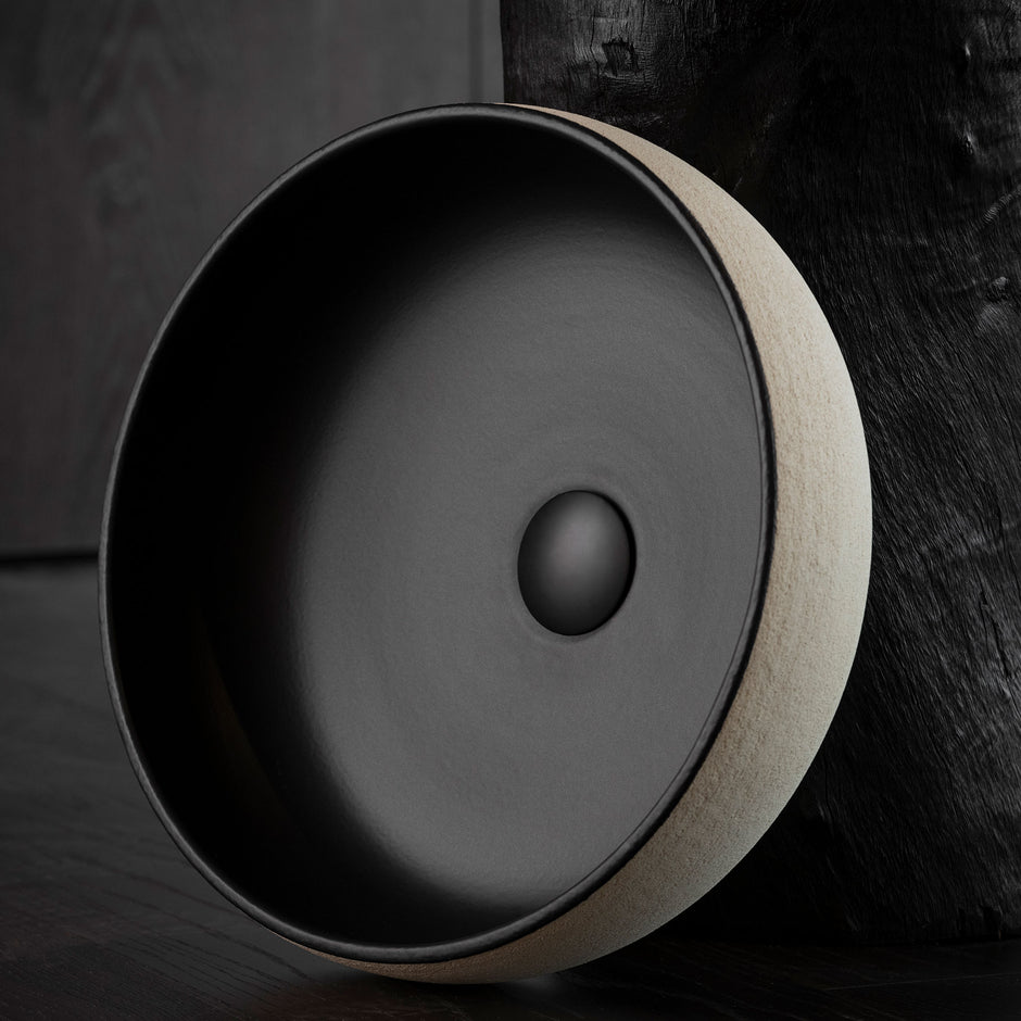 Terzofoco Light Earth and Matte Black Curved Counter Top Basin in a styled room