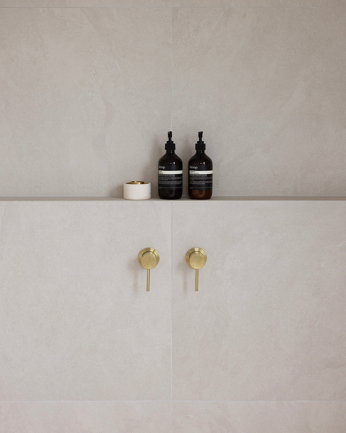 Bloom Wall Mixer styled in a bathroom