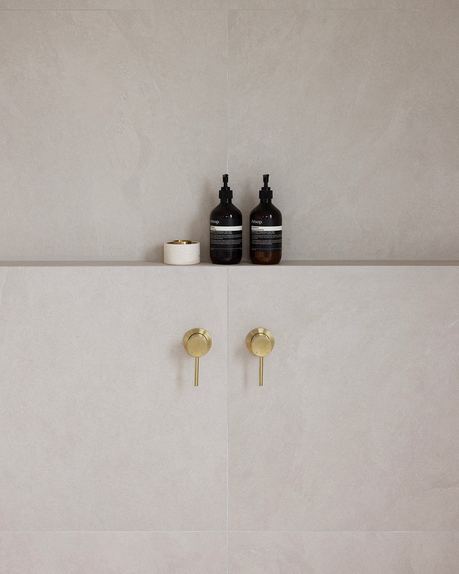 Bloom Wall Mixer styled in a bathroom