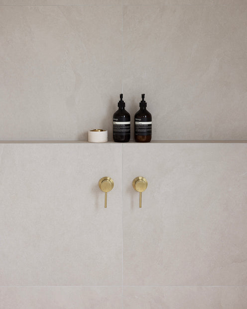 Bloom Wall Mixer styled in a bathroom