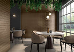 Aurea Brass Matt Ceramic Subway Tiles in a room setting
