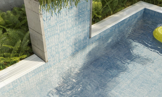 Auristella Azul Gloss Porcelain Subway Tiles in a room setting