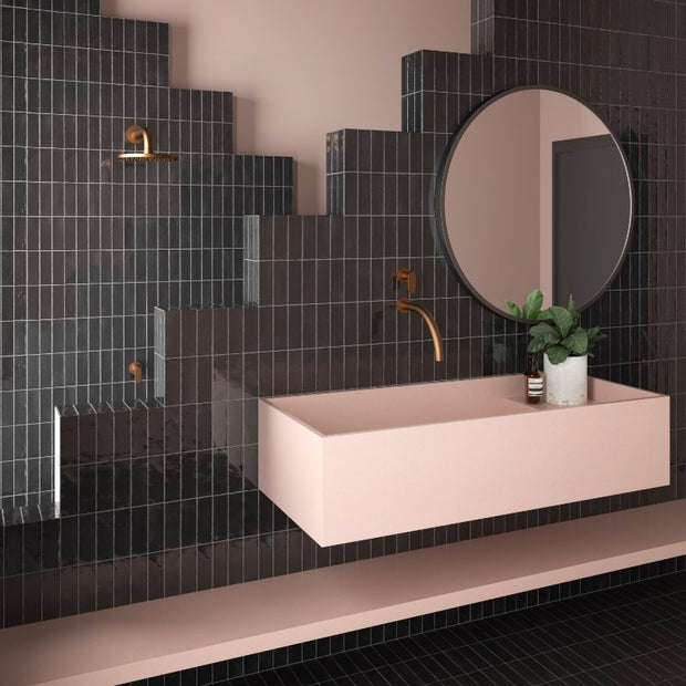 Coco Black Hat Gloss Porcelain Subway Tiles in a room setting