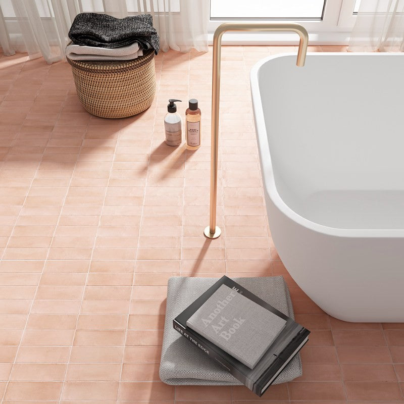 Coco Orchard Pink Matt Porcelain Subway Tiles in a room setting