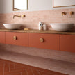 Coco Orchard Pink Matt Porcelain Subway Tiles in a room setting