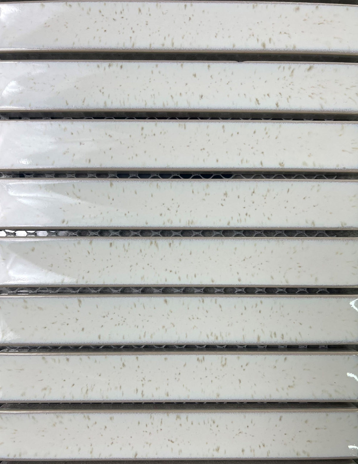 Concave Stone Gloss Porcelain Mosaic in a room setting