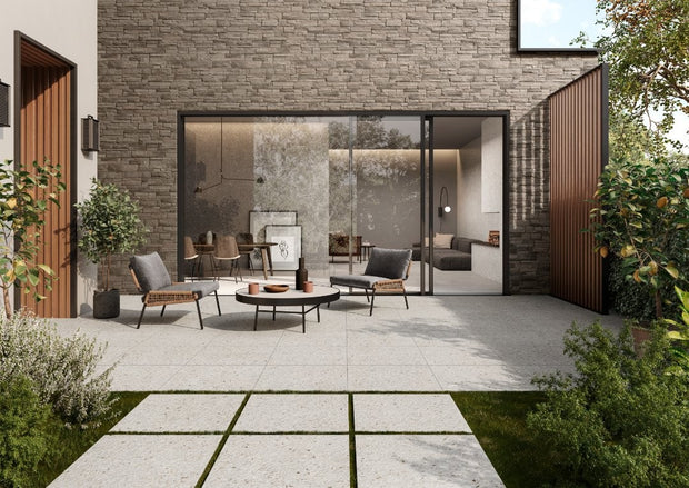 Frammenta Bianco Rock Textured Terrazzo Look Porcelain Tiles in a room setting