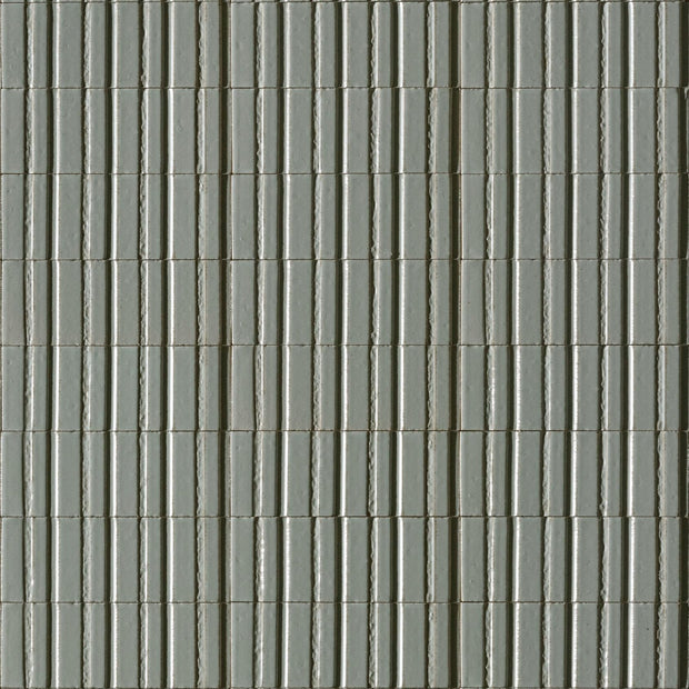 Glace Avio 3D Structured Gloss Porcelain Subway Tiles in a room setting