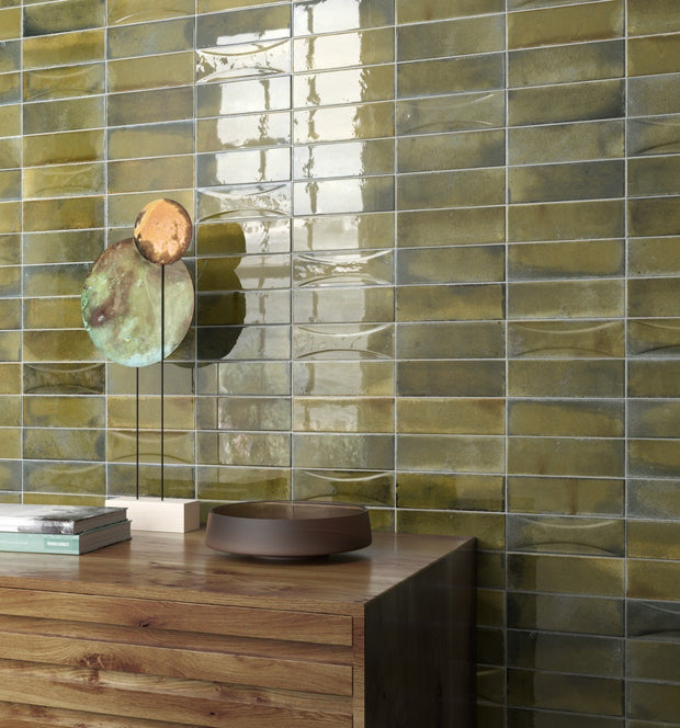 Hanoi Wild Olive Gloss Ceramic Subway Tiles 65x200mm in a room setting