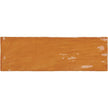 La Riviera Ginger Gloss Ceramic Subway Tiles in a room setting