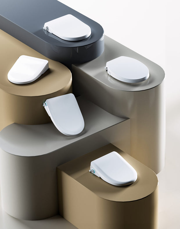Lafeme bidet seat range displayed on stone podiums