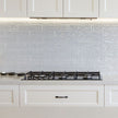 Lodge Greige Wavy Gloss Porcelain Subway Tiles in a room setting