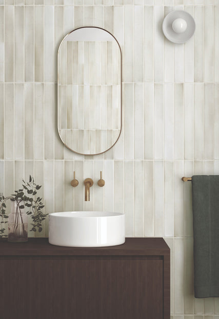 Massimo Almond Satin Ceramic Subway Tiles in a room setting