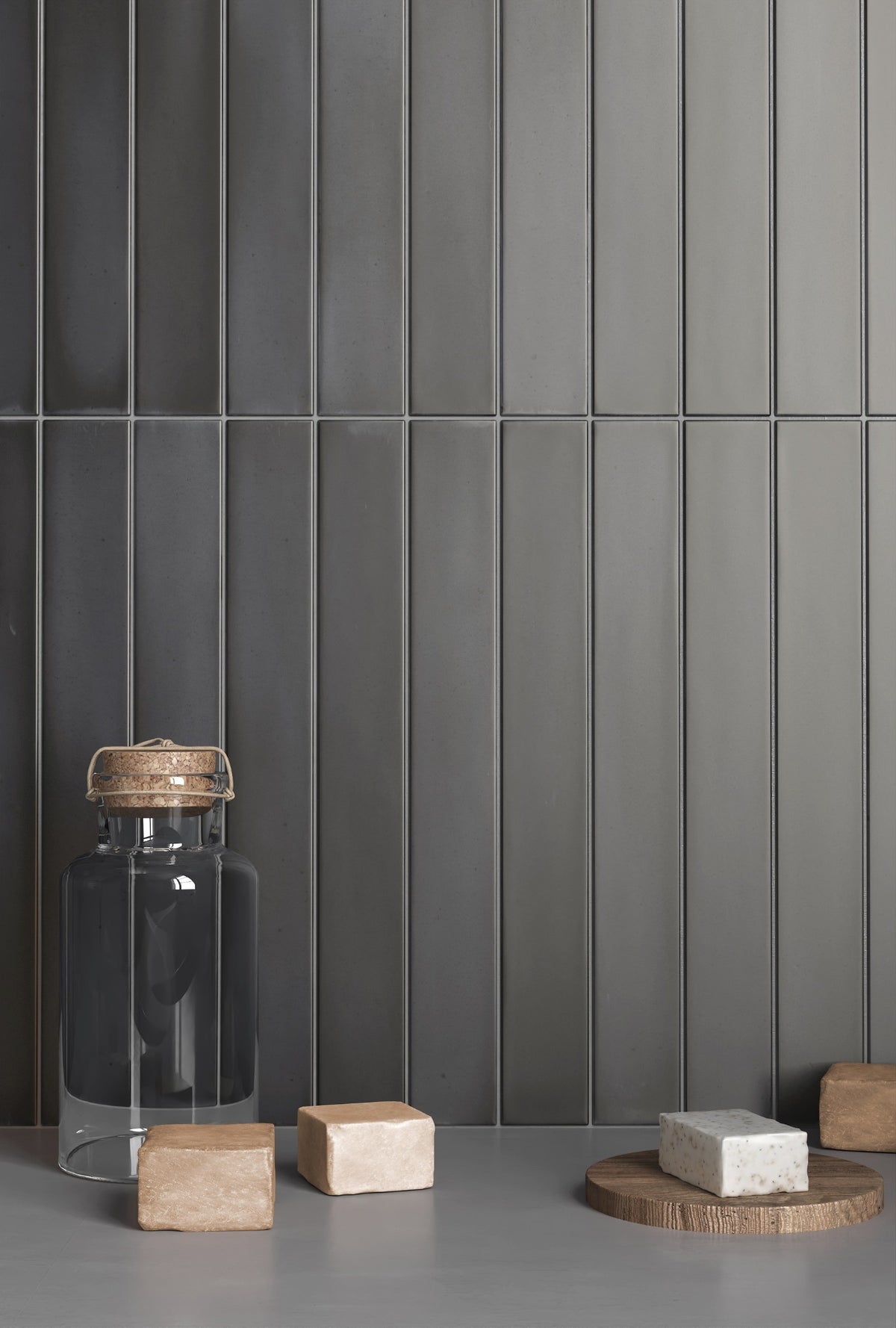 Massimo Dark Black Satin Ceramic Subway Tiles in a room setting
