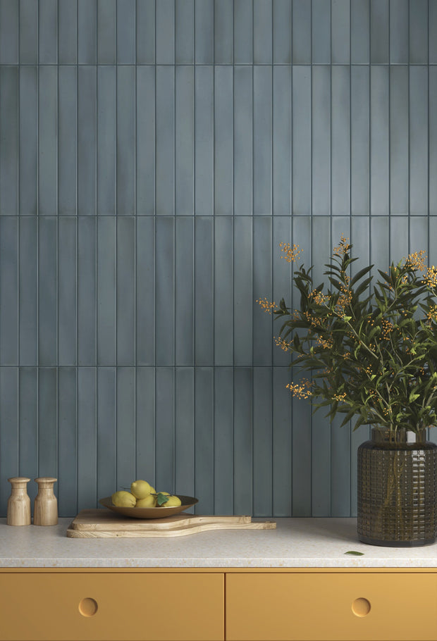 Massimo Smoke Blue Satin Ceramic Subway Tiles in a room setting