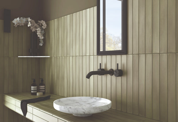 Massimo Verd Satin Ceramic Subway Tiles in a room setting