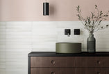 Massimo White Satin Ceramic Subway Tiles in a room setting