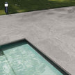 Pietra Leaden Drop Face Porcelain Pavers in a room setting
