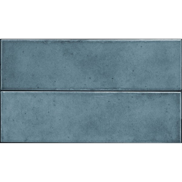 Shallow Ocean Gloss Porcelain Subway Tiles in a room setting
