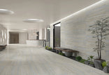 Euromarmo Travertine Silver Gold Marble Look Porcelain Tiles in a room setting