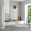Tribeca Grey Whisper Gloss Porcelain Subway Tiles in a room setting