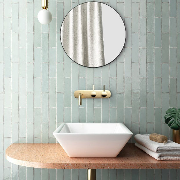 Tribeca Seaglass Mint Gloss Porcelain Subway Tiles in a room setting