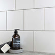 White Square Matt Ceramic Wall Tiles in a room setting